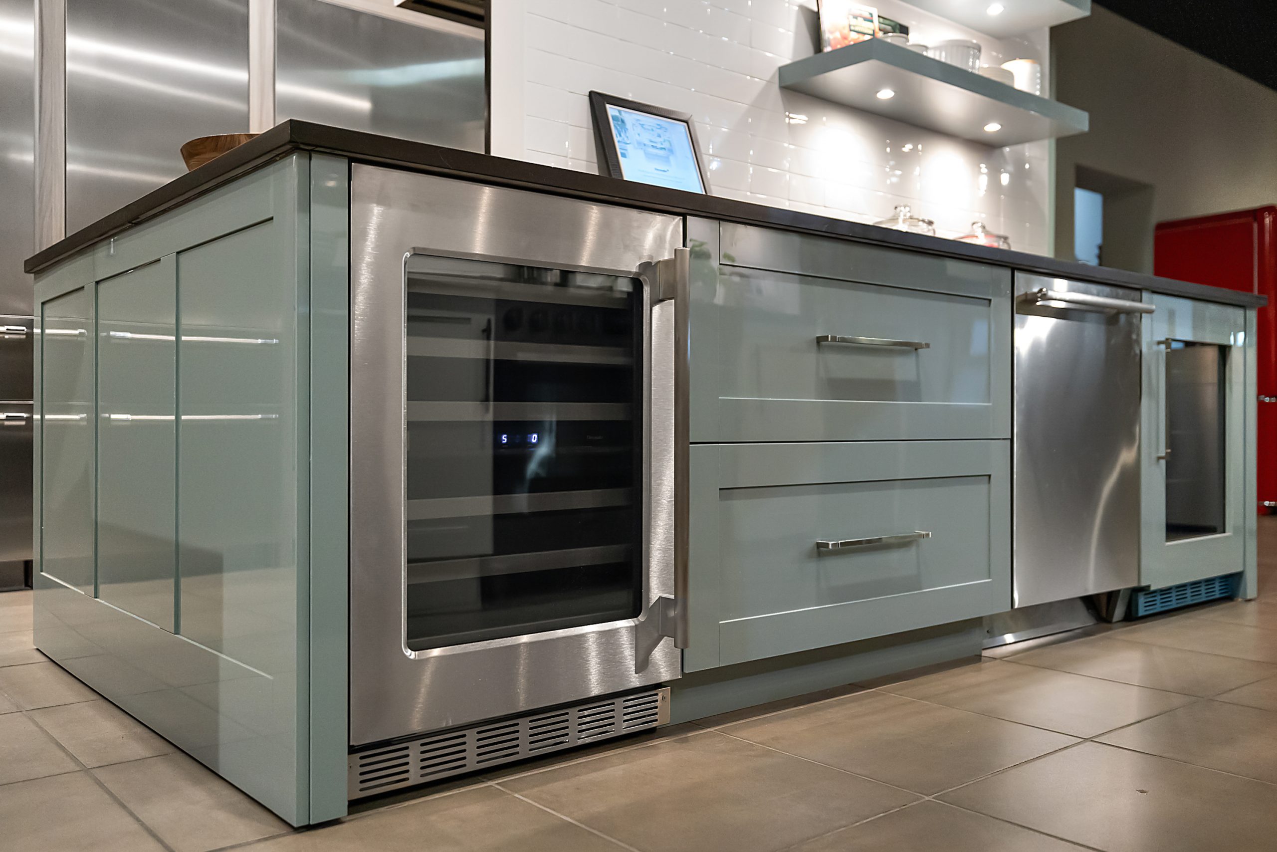 Appliance showroom display with built-in wine cooler and under-counter oven